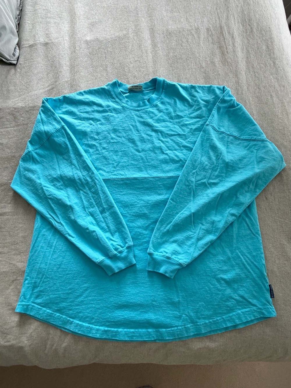 Spirit Women's Long-Sleeve Crewneck Tee in Turquoise Blue